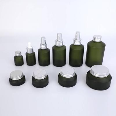 Skincare green slanted shoulder glasses bottles jars sets