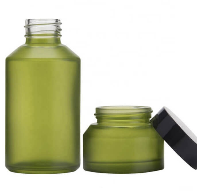 Wholesale Matte green cosmetic glass bottle set 