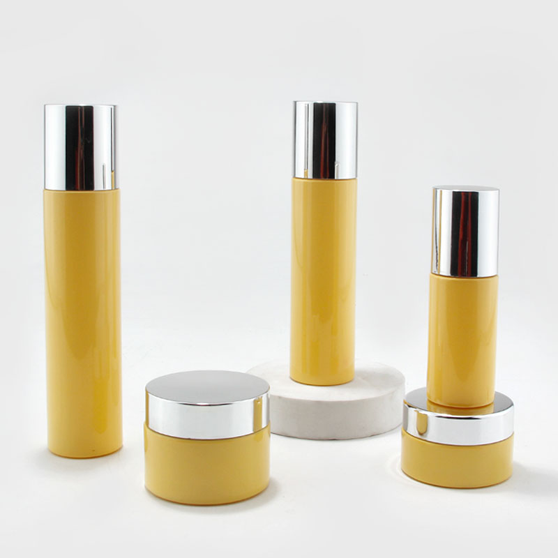 Flat shoulder cosmetic glass bottle set 