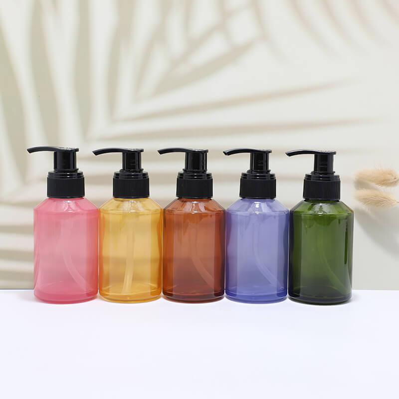 Slanted shoulder glossy glass bottle