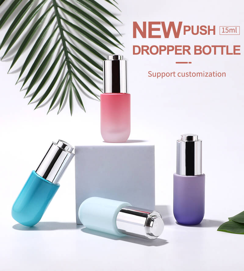 Cosmetic glass bottle with push press dropper 