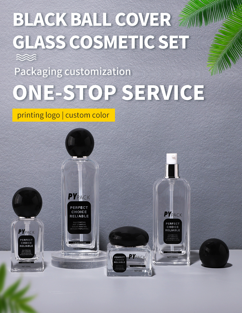 Clear frosted glass bottle set with black ball cover