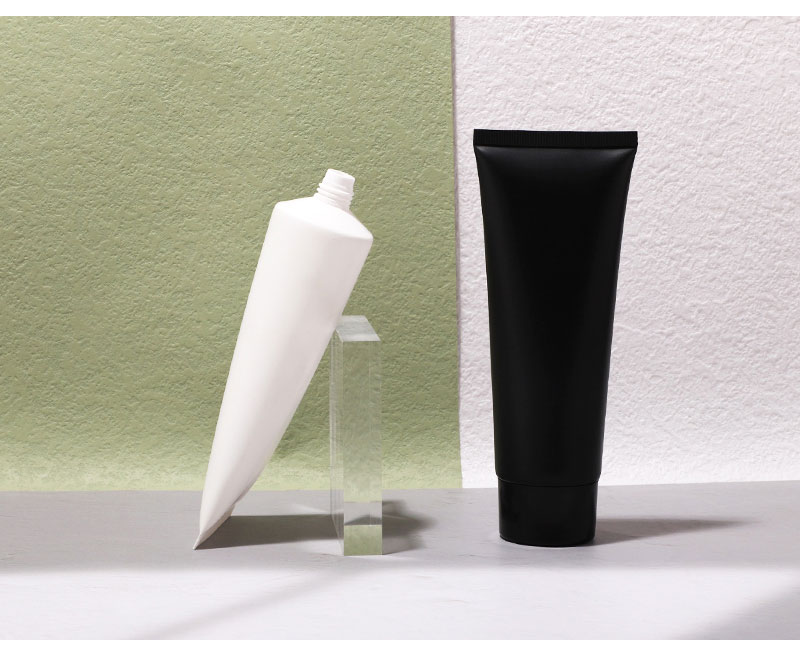 black white hand cream tube