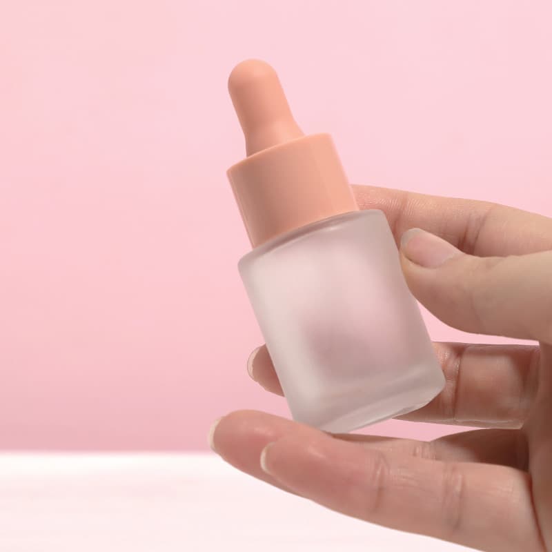 pink cap glass dropper bottle