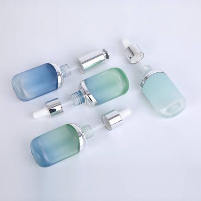 Cosmetic frosted essential oil glass dropper pump bottle
