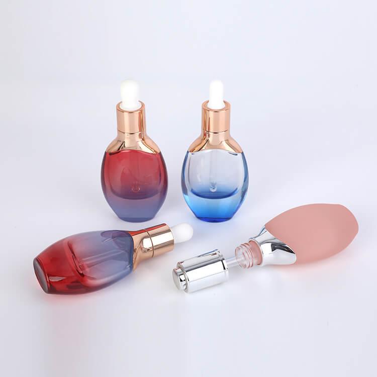 Clear frosted transparent blue glass dropper bottle