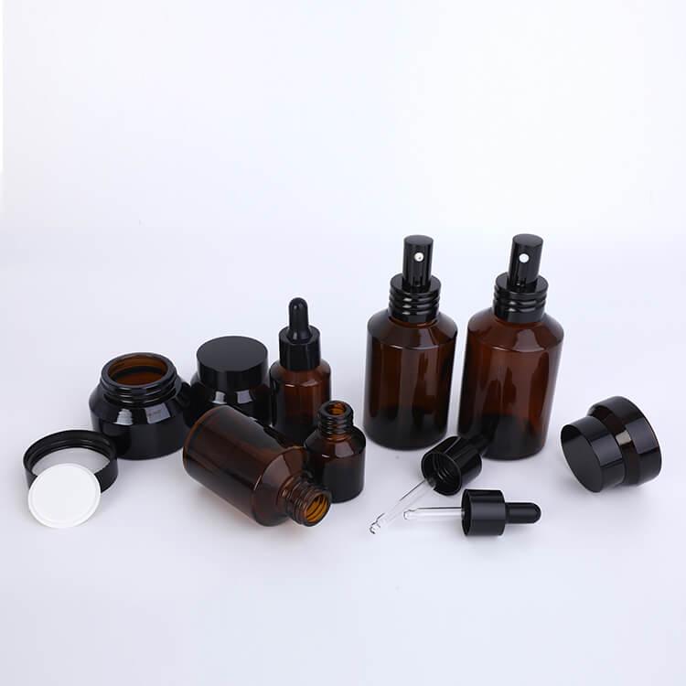 Cosmetic frosted amber glass bottles and jars set