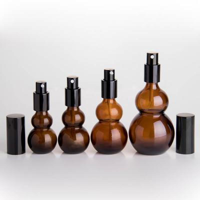 Double gourd shape amber glass bottles with pump