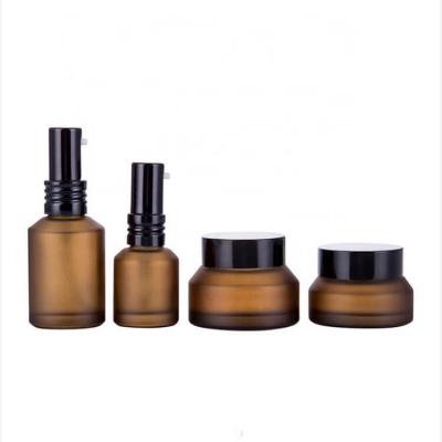 Frosted amber glass spray bottles and jar for cosmetic