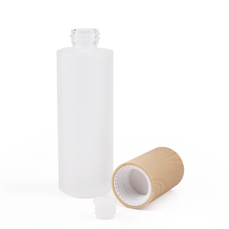 clear glass bottle with lid