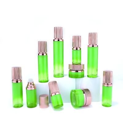 Green color glass bottle set with aluminum screw cap