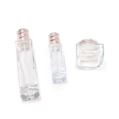 Clear square cosmetic glass bottle set with aluminum lid