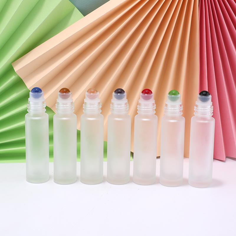 Colorful empty glass roll on bottle