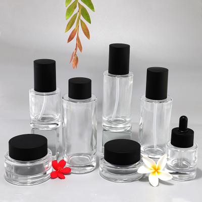Clear round glass bottle jar with matte top