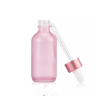 Wholesale pink color essential oil glass dropper bottle