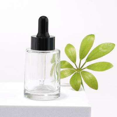 Clear transparent glass essential oil bottle