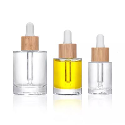 Clear thick bottom skincare serum bottle  custom empty hair oil cosmetic glass dropper bottle