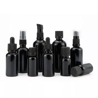 black essential oil glass bottle