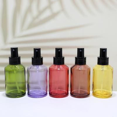 Wholesale green glass bottle with lotion pump for cosmetic packaging