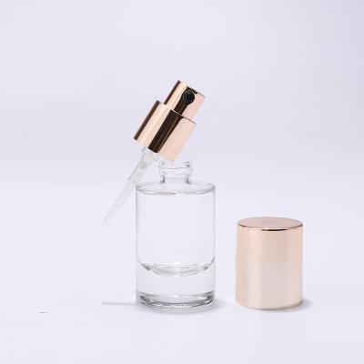 Wholesale clear round glass bottle with lotion pump