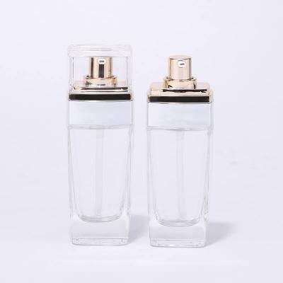 Luxury clear gold pump glass bottle