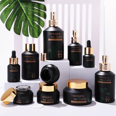 Factory prices matte black cosmetic glass bottle set
