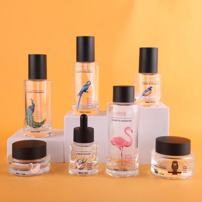 New design cosmetic glass bottle set