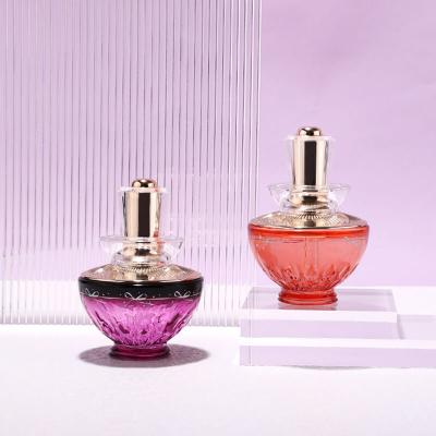 High end gold cosmetic glass bottle for cosmetic cream container package golden pattern