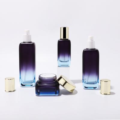 Newest colorful square glass lotion pump bottle set for cosmetic packaging