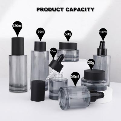 Grey flat shoulder glass bottle set for cosmetic packaging skincare