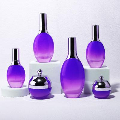 Flat shoulder cosmetic glass bottle set with aluminum lid