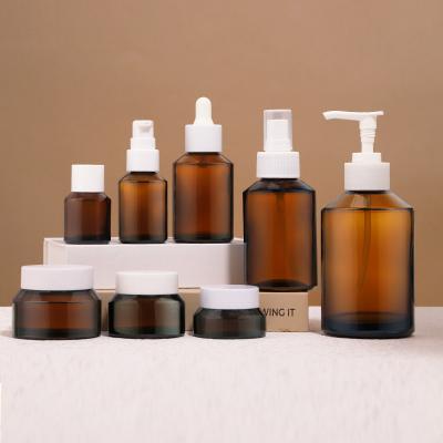 Simple Style Amber Slanted Shoulder Skincare Glass Bottle Set